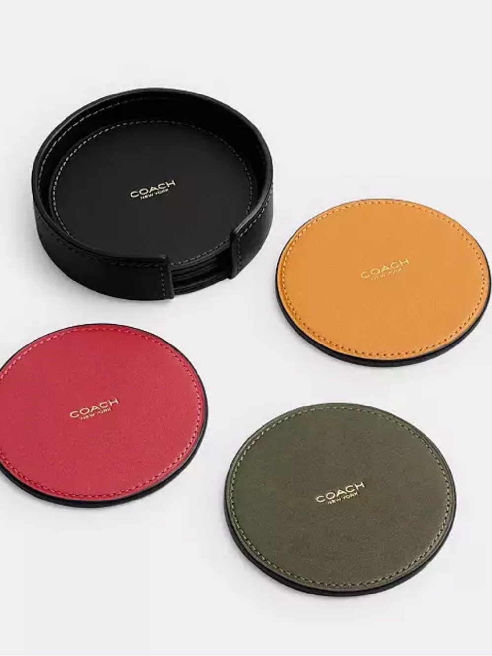 COACH Round Leather Coaster Set in Black, Orange, Red, Green